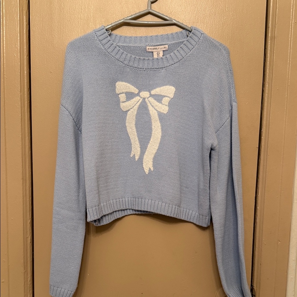 Light Blue Sweater with Bow Design